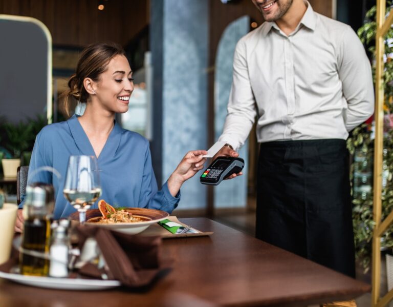 The final step of a great dining experience: an easy payment process streamlined by restaurant business automation systems.