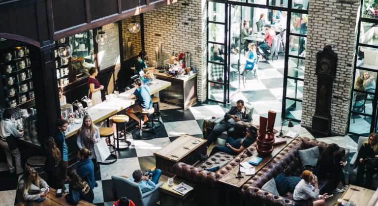 A bustling restaurant environment, showcasing the efficiency gained from a comprehensive syrve training program.