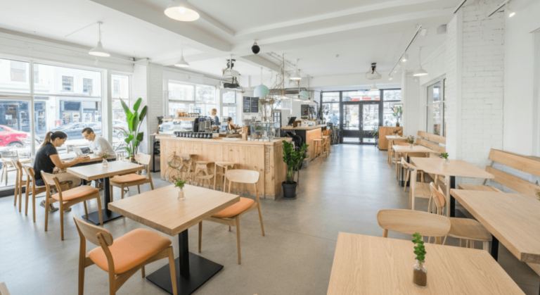 Guests enjoying a meal at a catered event, where a CRM for catering helps manage the seamless service