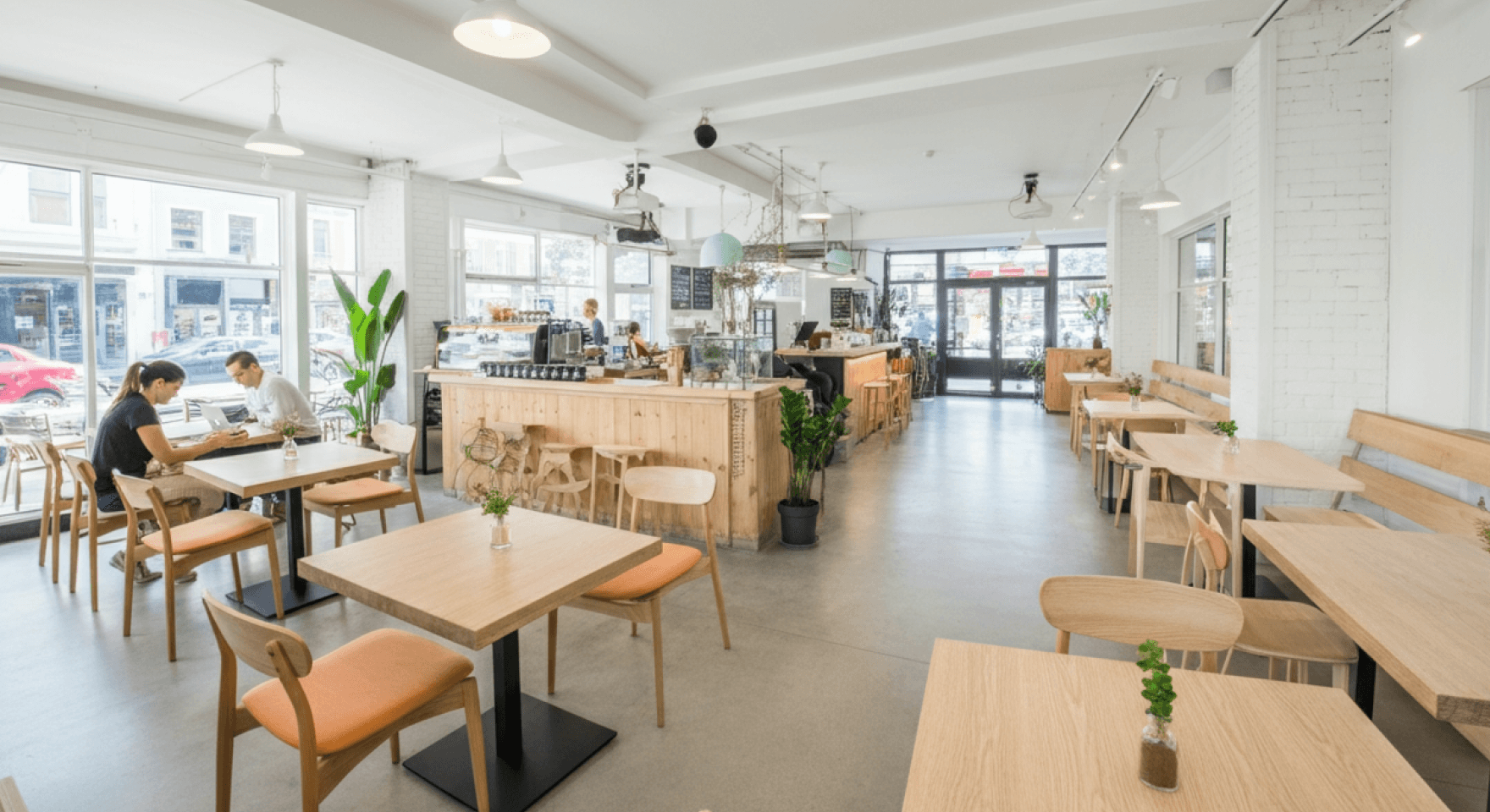 Guests enjoying a meal at a catered event, where a CRM for catering helps manage the seamless service