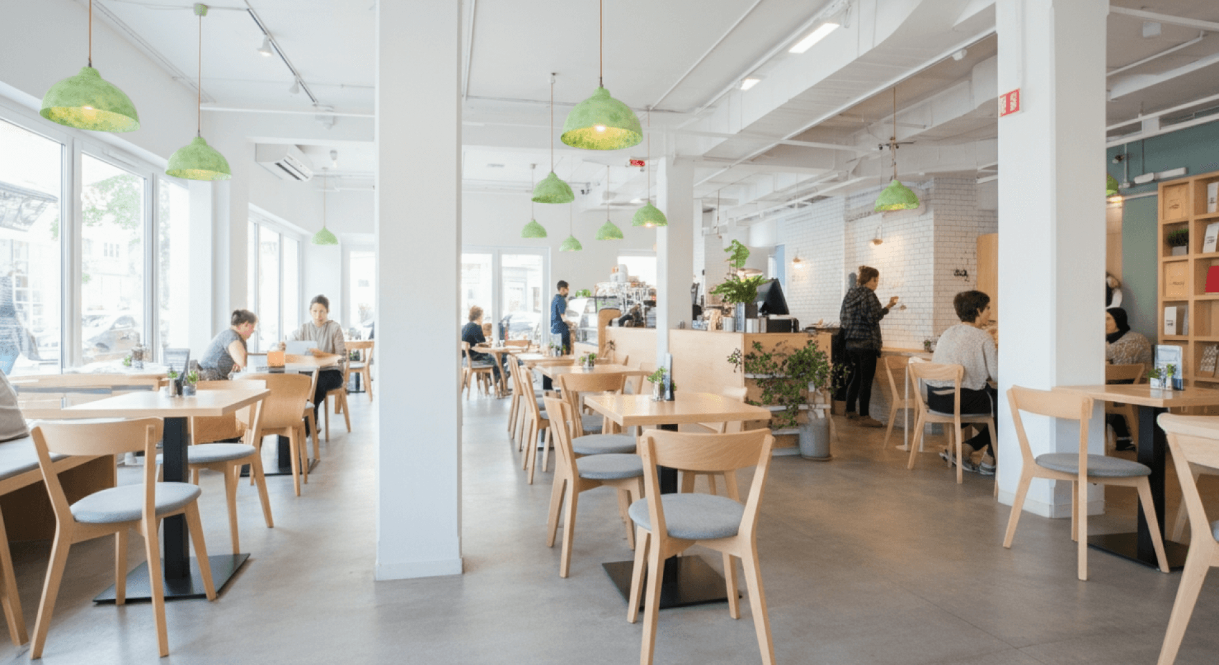 A bustling restaurant interior where the entire operation is efficiently managed by restaurant business software