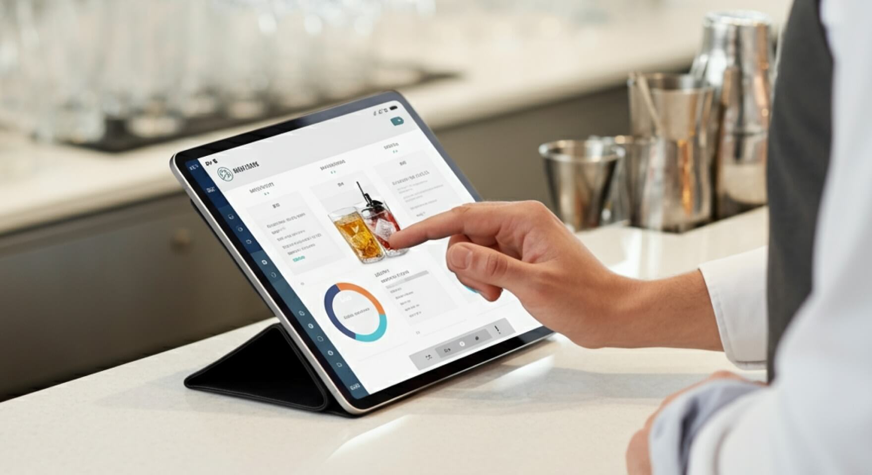 A bartender updates data on a tablet—modern restaurant inventory management in action