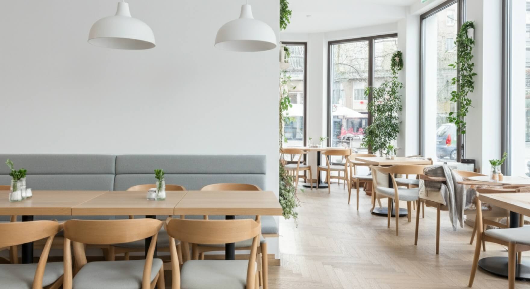 A clean cafe ready for opening, where a CRM for cafe helps manage upcoming reservations